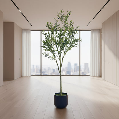 Artificial potted plant with green leaves on a white background