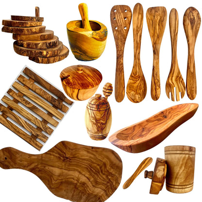 Collection of wooden kitchen utensils and tools on a white background